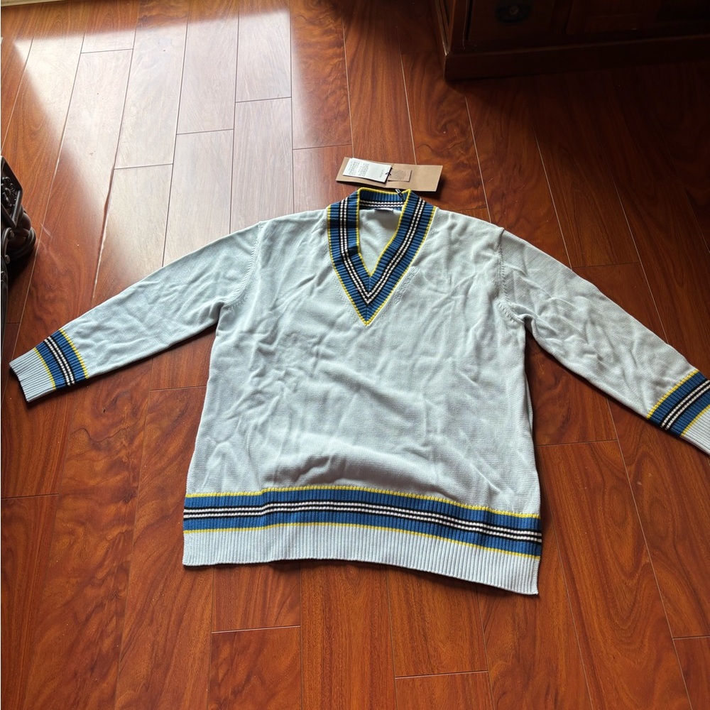 Burberry woman  big size open side more like a pull over cardigan.